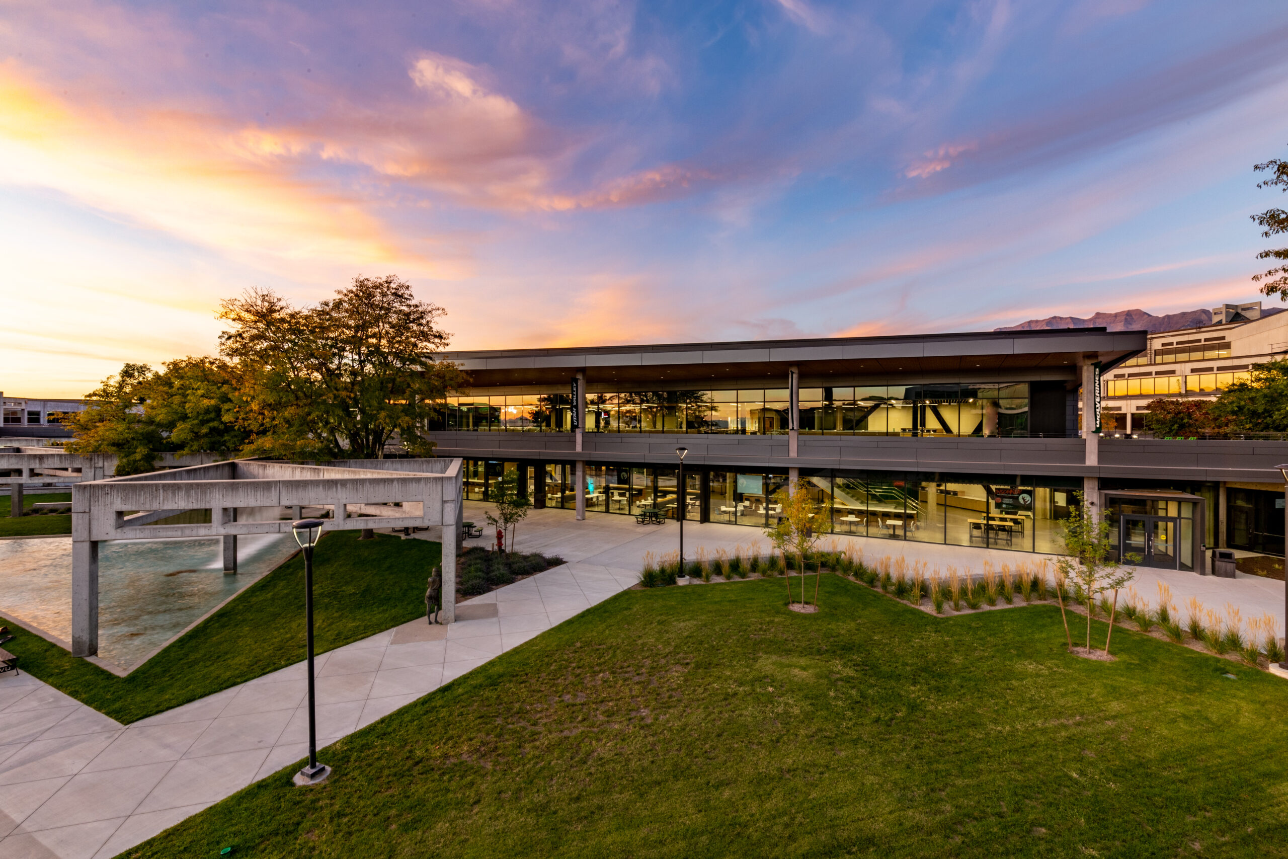 UVU campus building illuminated at sunset